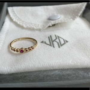 14k gold custom ring with ruby stones